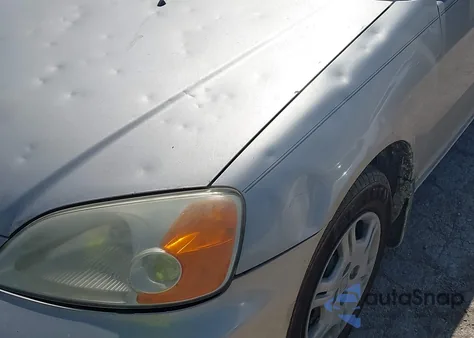 2002 Honda Civic Lx z USA, uszkodzony, nr VIN 1HGEM21502L077129